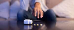 Prescription Painkiller Addict Reaching for Pills