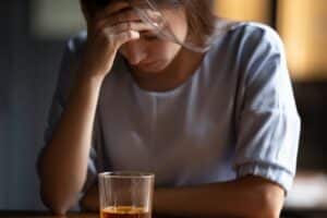 Woman wondering if alcoholism is a mental illness