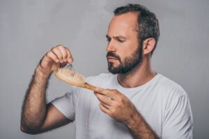 Man experiencing hair loss due to cocaine use